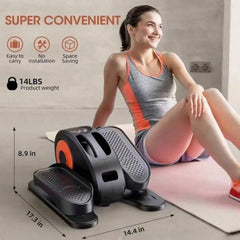 Woman using under desk elliptical machine leg exerciser while seated for low-impact workout